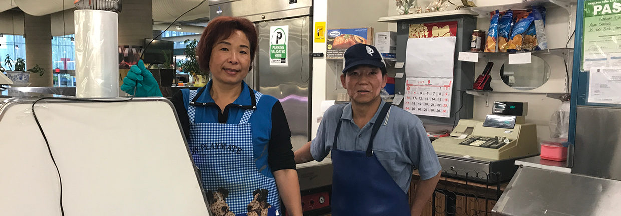 Owners of Argo stand proudly on front on their stall