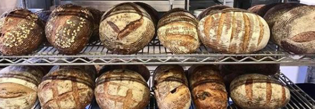 Displaying a wide variety of breads on display for customers to choose from