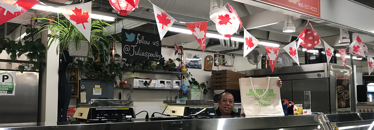 Owners stand on front of their stall