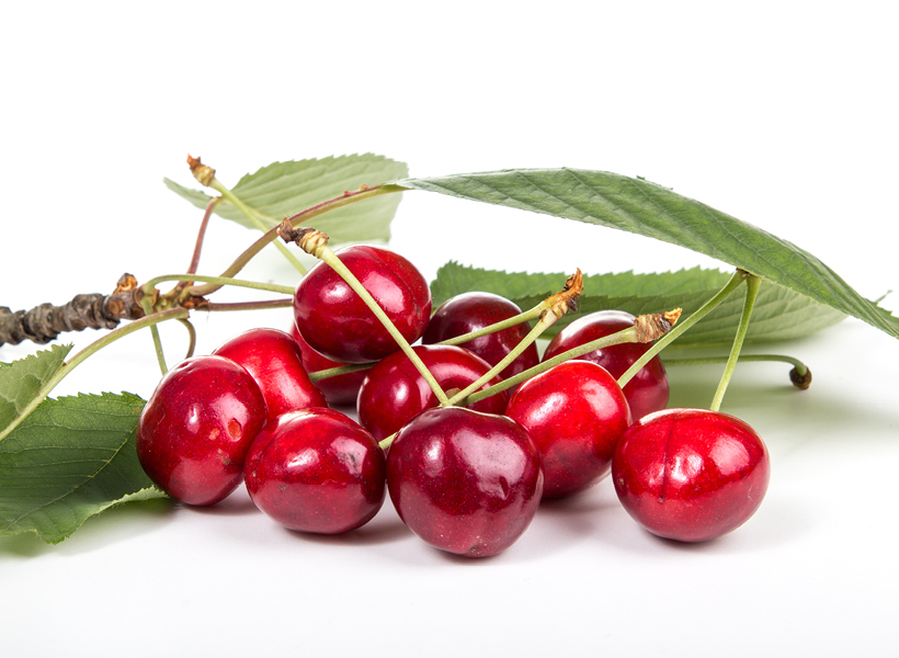 Group of 10 Cherries laying out in a bunch