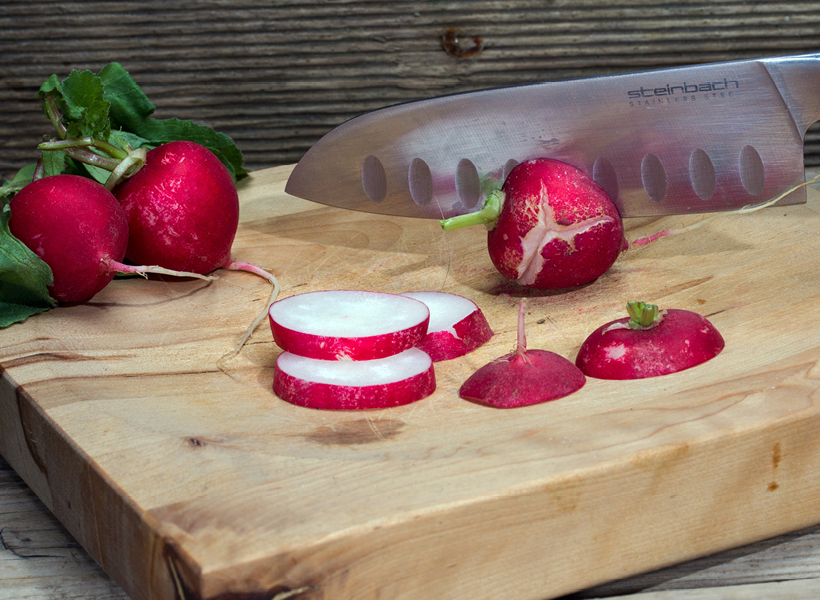 Ontario Radishes on the cutting Board, ready to be sliced for serving